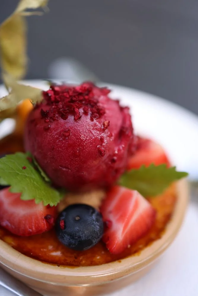 Artisan Berry Tart with fruit coulis