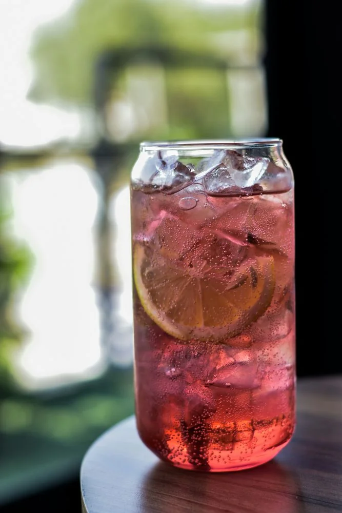 Chilled Pink Lemonade with fresh lemon slices and ice